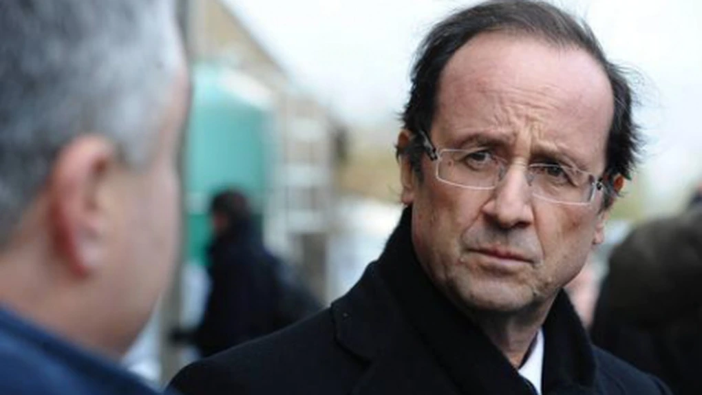 Hollande pierde un punct în faţa lui Sarkozy înaintea turului doi al alegerilor