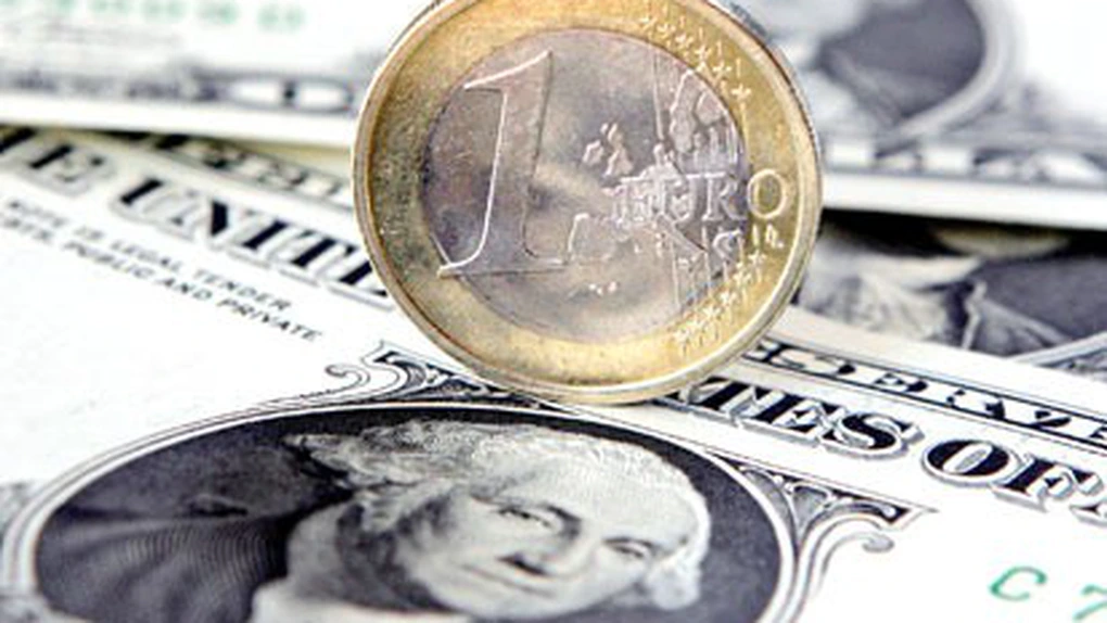 Euro a scăzut sub 1,28 dolari/unitate, prima oară în peste patru luni, din cauza Ciprului şi Italiei