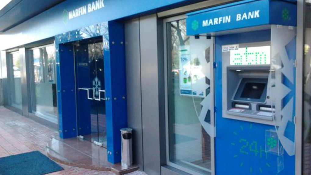 Clienţii Bank of Cyprus îşi pot retrage banii începând de astăzi de la Marfin Bank România