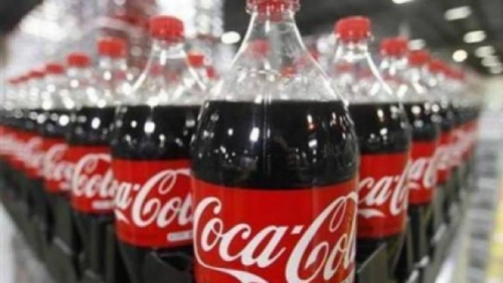 Coca - Cola îşi va reduce costurile pe fondul scăderii profitului