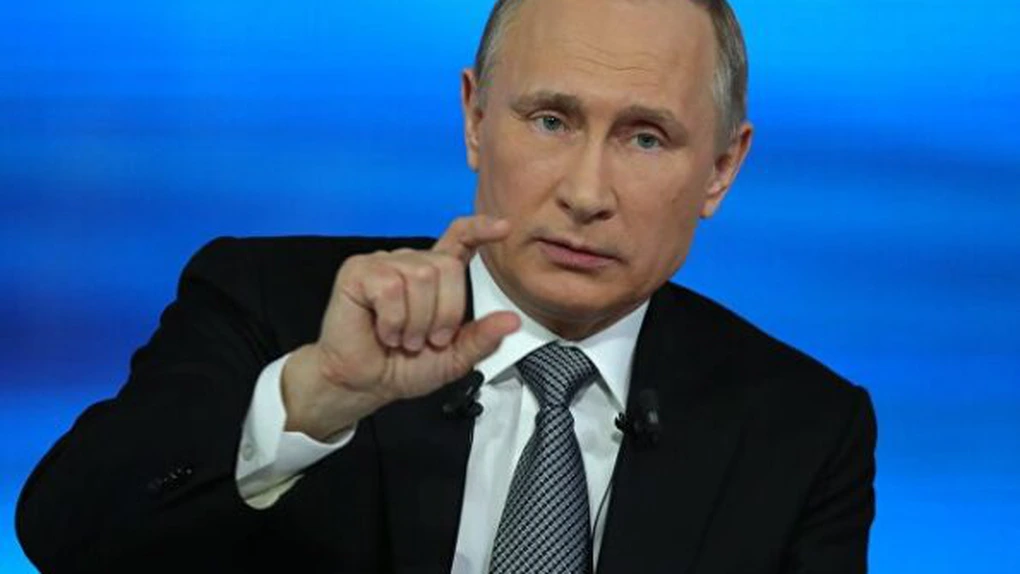 Putin denunţă 'un atac' împotriva postului RT în SUA şi promite 