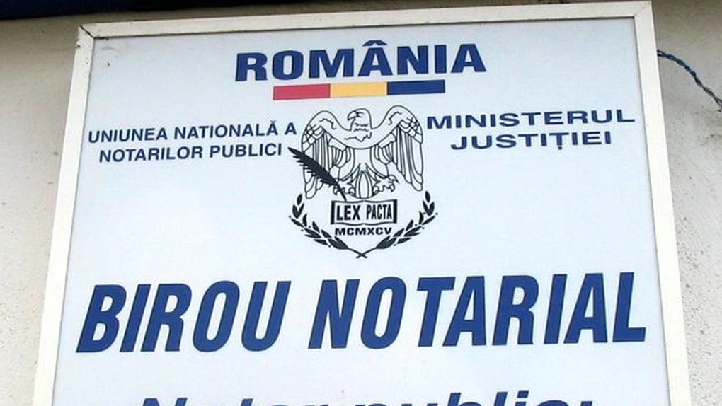 Legea de modificare a OUG privind activitatea notarială a fost promulgată de preşedintele Iohannis