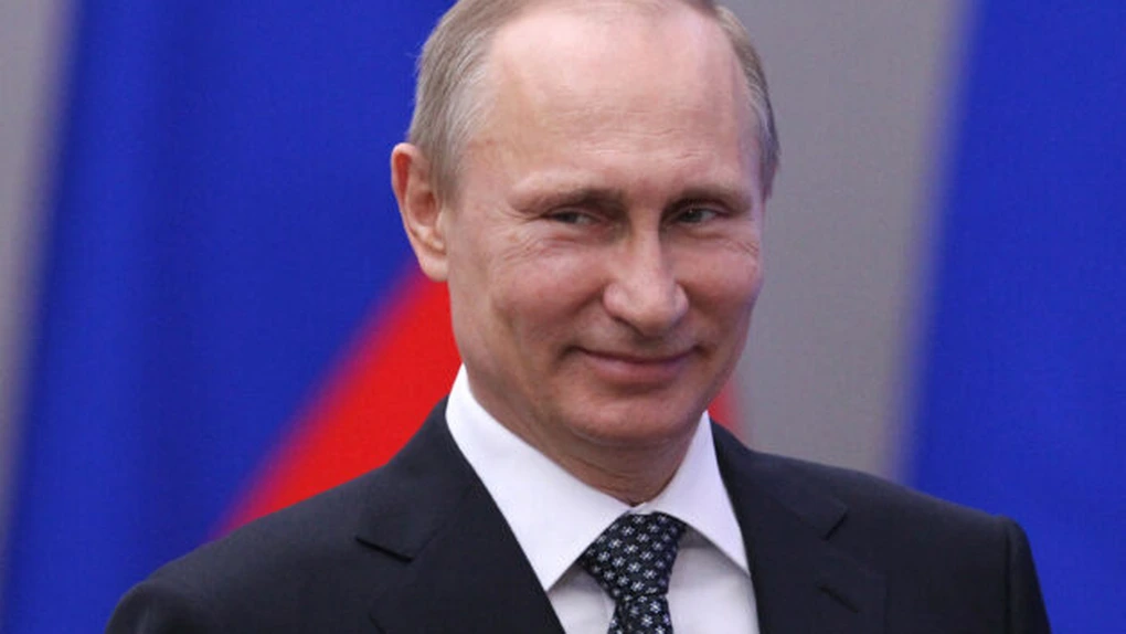 Putin l-a decorat pe şeful OMV