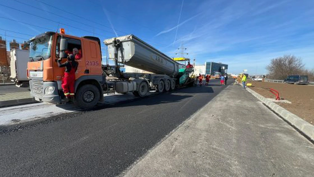 Centura București: A fost așternut stratul de uzură la prima parcare de lungă durată, ce ar putea fi gata în aprilie - secretar de stat
