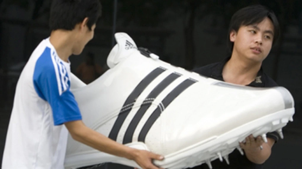 Adidas raportează primele pierderi anuale din 1992 încoace, dar menţine plata dividendelor