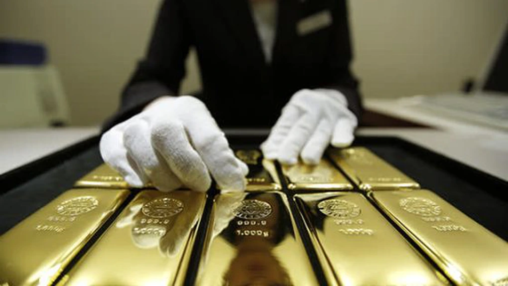 Aurul mai sparge un record - Cotaţia a atins un nou maxim istoric şi a depăşit pragul de 2.300 de dolari/uncie