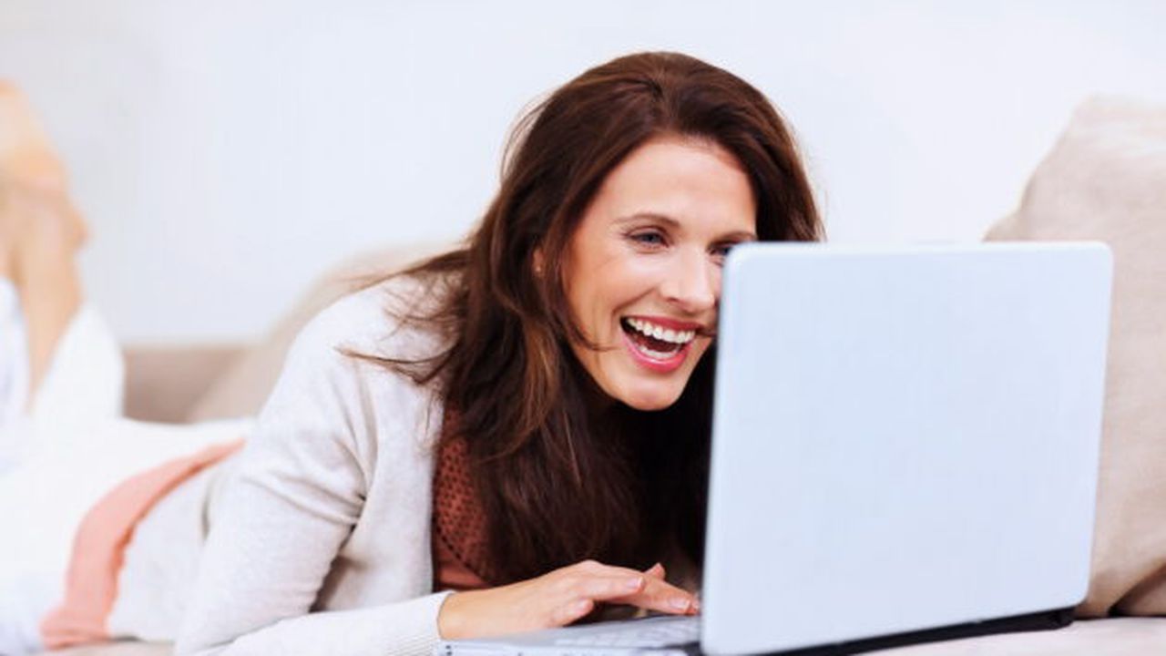 bigstock-happy-mature-woman-using-lapto-6263612_32729200