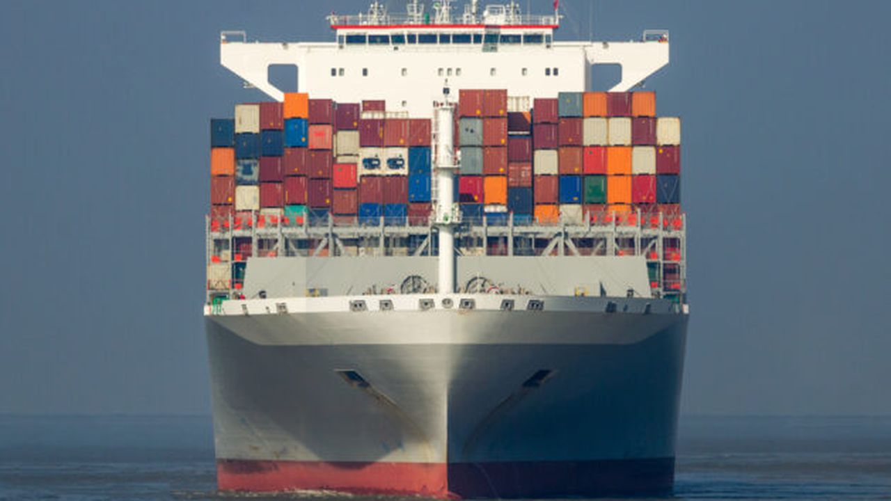 front view of a cargo shipping sea container ship