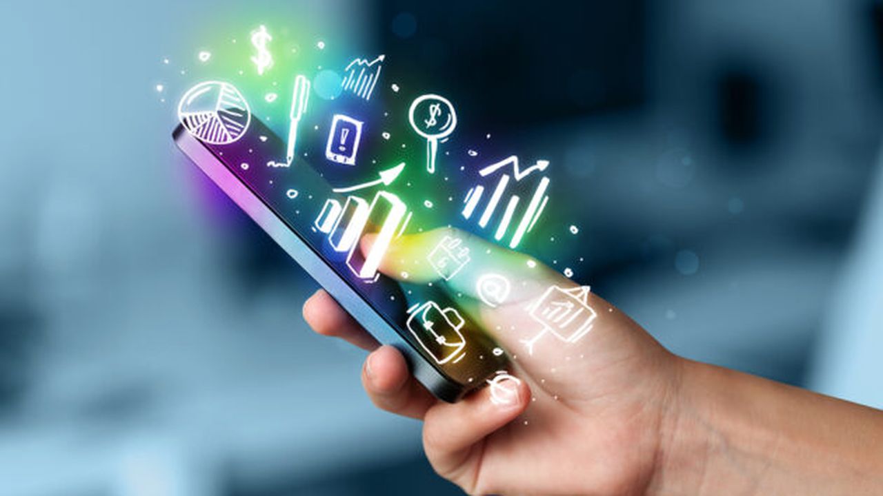 Smartphone with finance and market icons and symbols concept