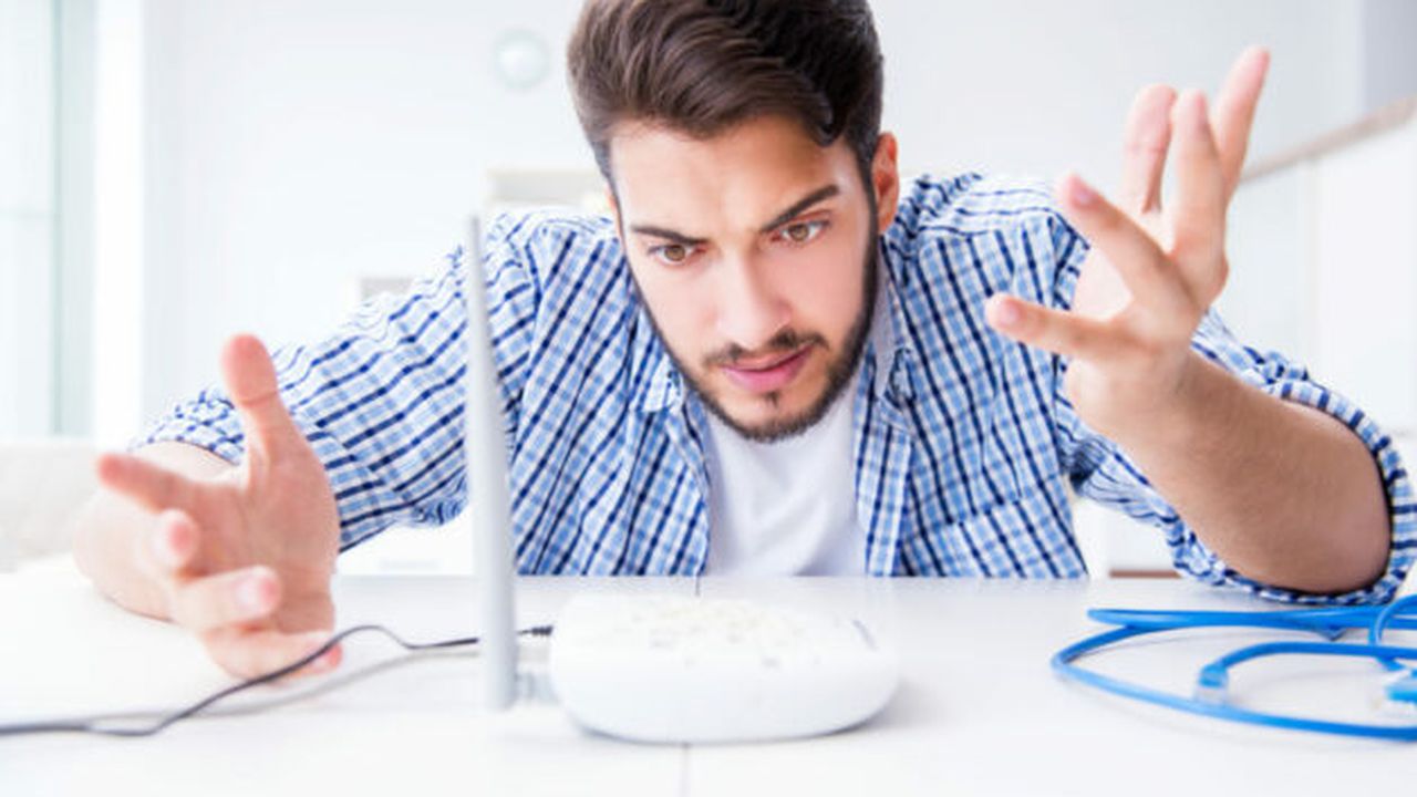 Frustrated young man due to weak internet reception