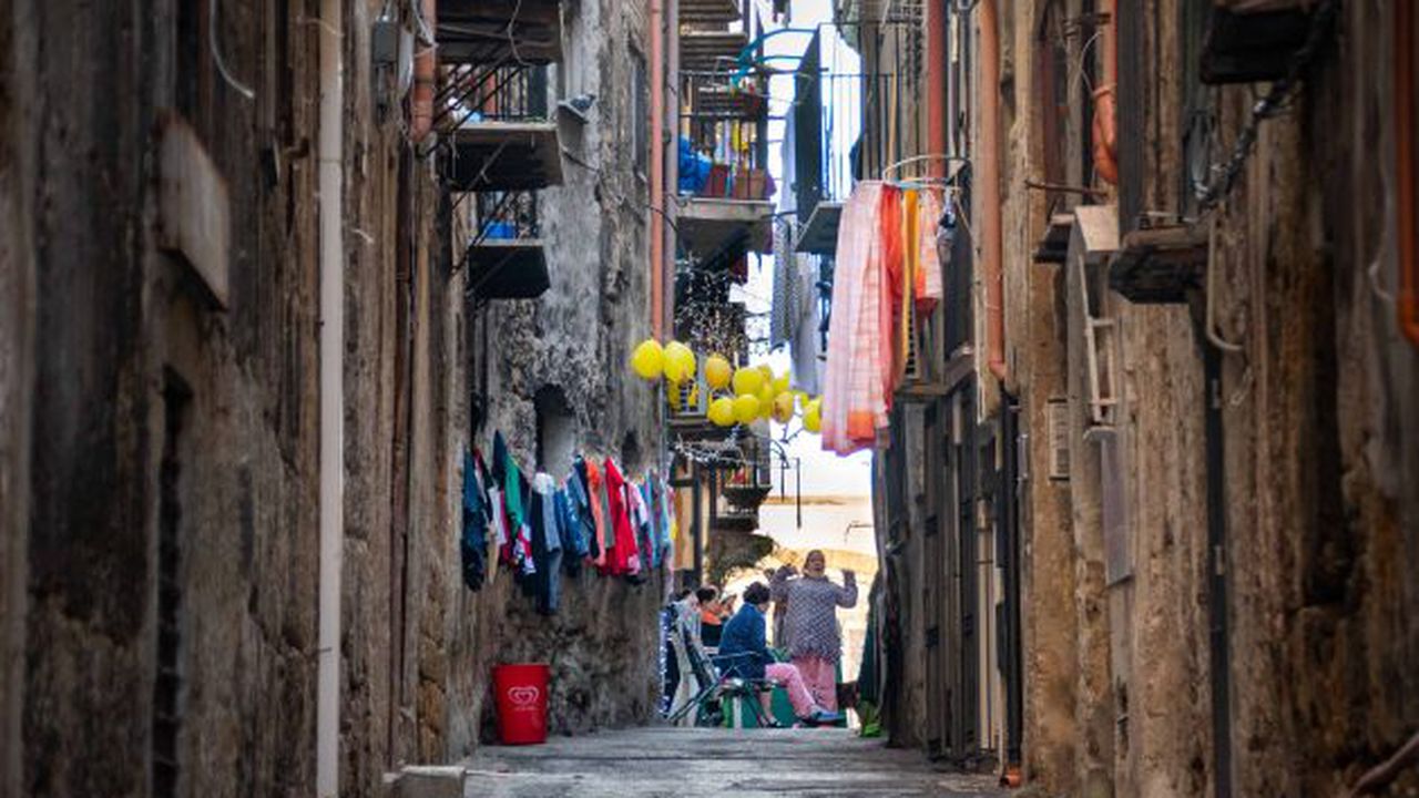 Street life in the narrow streets of Palermo on the island of Si