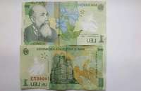 Leul s-a depreciat, marţi, în raport cu euro şi dolarul american