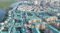 Cosmopolis – povestea comunităţii dezvoltate de turcul Ahmet Emre Buyukhanli. Investiţii şi afaceri