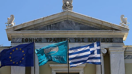 Grecia a activat clauza prin care obligă creditorii privaţi să participe la schimbul de obligaţiuni
