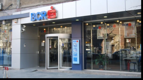 BCR şi Raiffeisen Bank România, retrogradate de Moody's