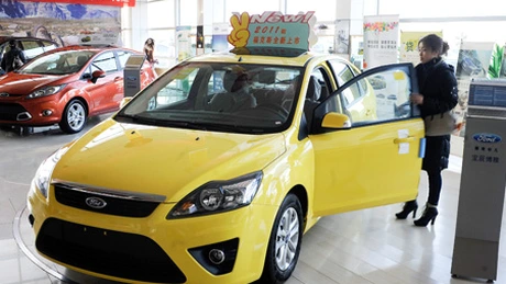 Ford vrea să vândă în China peste un milion de maşini în 2014