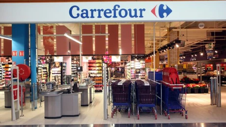 Acţiunile Carrefour s-au prăbuşit cu 13% pe bursă, după ce compania a anunţat profit în scădere puternică şi reducerea investiţiilor