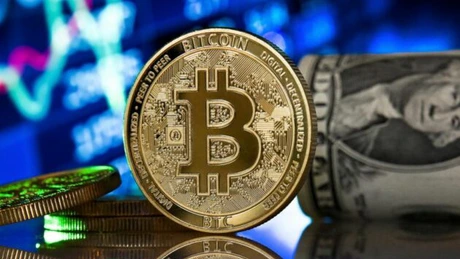 Bitcoin scade sub 60.000 de dolari, pentru prima dată de la 1 noiembrie