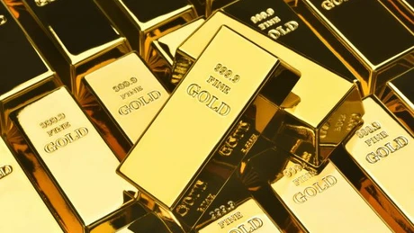 Creşterea dolarului a scăzut preţul aurului. Recenta depreciere şi scăderea dobânzilor la bonduri ar putea duce cotaţia aurului la peste 1.700 de dolari pe uncie