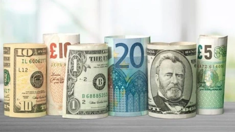 Leul s-a depreciat, marţi, în raport cu euro, dar a crescut faţă de dolarul american