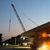 FOTO Autostrada Bucureștiului A0: „Nopți albe” pentru montarea ultimelor grinzi la cel mai lung pasaj al lotului 1 Nord, peste calea ferată și DN7