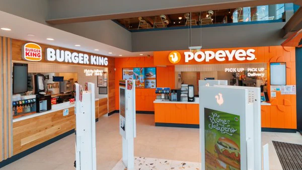 Premieră: Restaurant comun Burger King și Popeyes. Cele două lanțuri deschid într-un spațiu comun, în București
