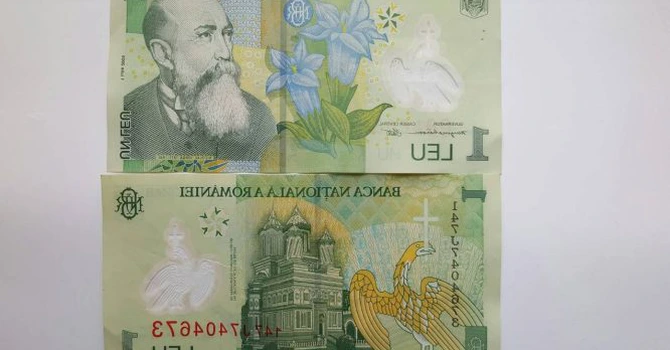 Leul s-a depreciat, marţi, în raport cu euro şi dolarul american