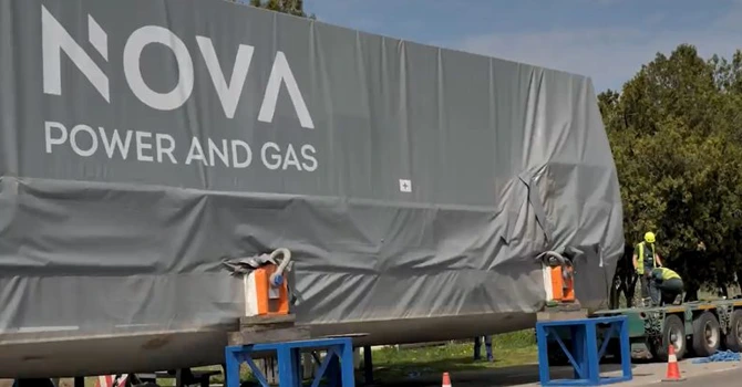 VIDEO O nouă centrală electrică făcută și deținută de români se apropie cu pași repezi de finalizare. Turbinele mari au ajuns pe șantier