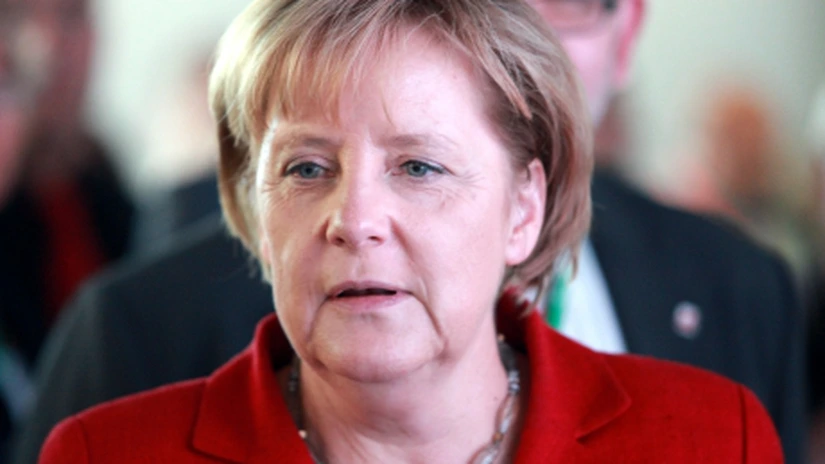 Merkel, invitată de Hollande la Palatul Elysee în ajunul summitului UE