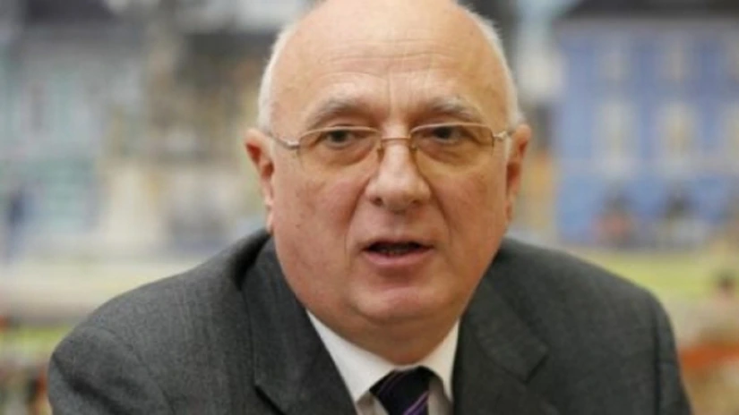 Ruşanu susţine că nu e în incompatibilitate, dar va supraveghea firma de la Bursă a familiei sale