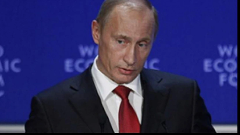 Vladimir Putin, gata să se întâlnească cu Petro Poroşenko în Franţa