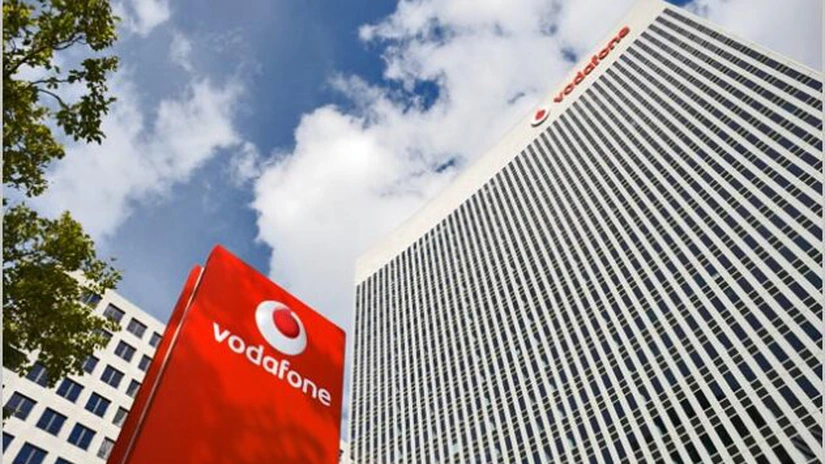 Vodafone va plăti dividende mai scăzute pentru a-şi reduce povara datoriei
