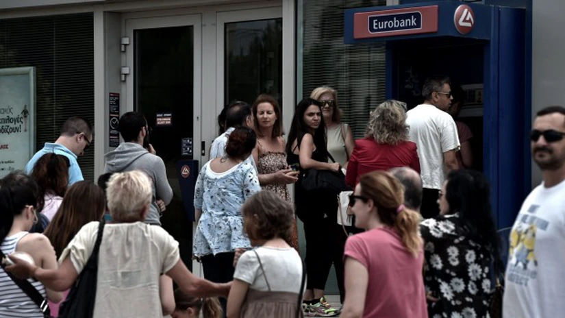Băncile greceşti se redeschid luni. Restricţiile la retragerile de numerar sunt mai relaxate