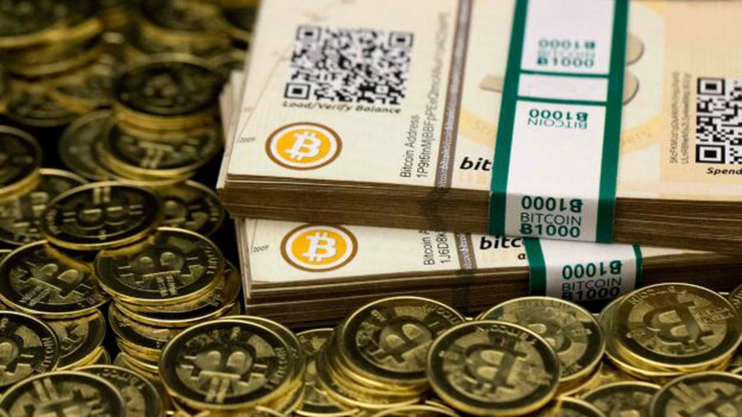 Bitcoin îşi continuă ascensiunea şi trece de 15.000 de dolari