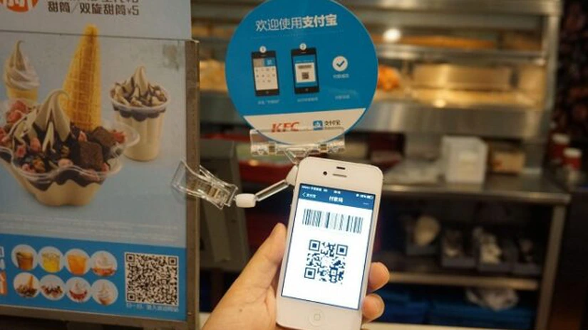 Apple şi Samsung vor intra pe piaţa de plăţi mobile din China