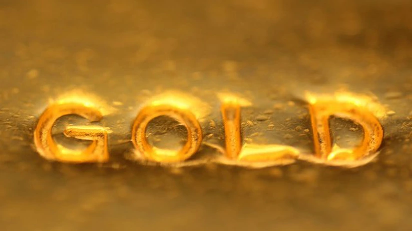 Aurul, umbrit de creşterea dolarului şi a petrolului - analiză