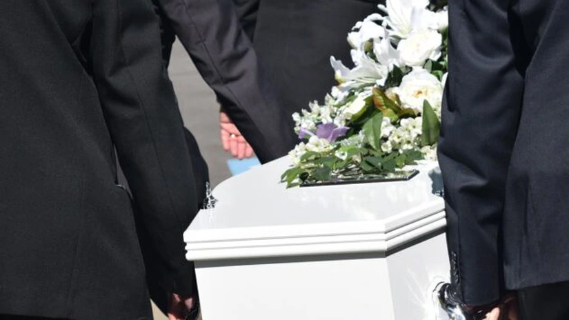 Ce acoperă ajutorul de înmormântare în România?