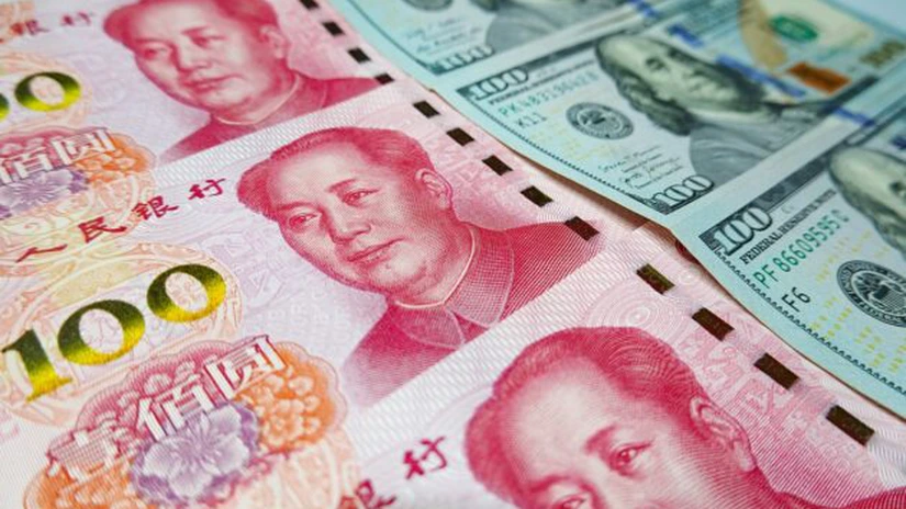 Yuanul depăşeşte dolarul, devenind cea mai utilizată monedă pentru tranzacţiile transfrontaliere în China
