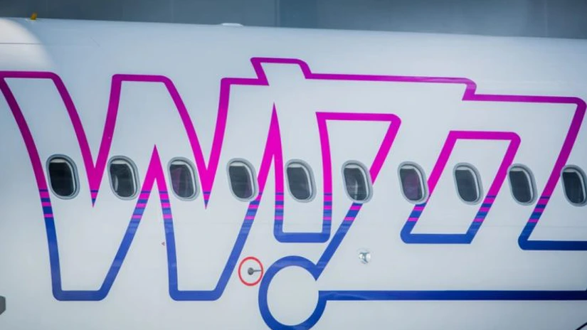 Zboară prin turbulențe, dar domină cerul României. Wizz Air raportează venituri de 5,7 miliarde de euro: Cât de dependentă e piața locală de operatorul low-cost